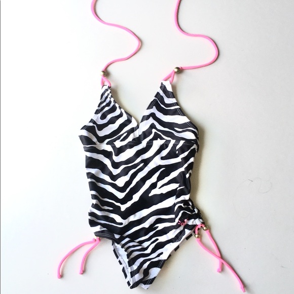 Sold on another site
Justice swimsuit with gold beads size 7 good condition - Picture 2 of 2